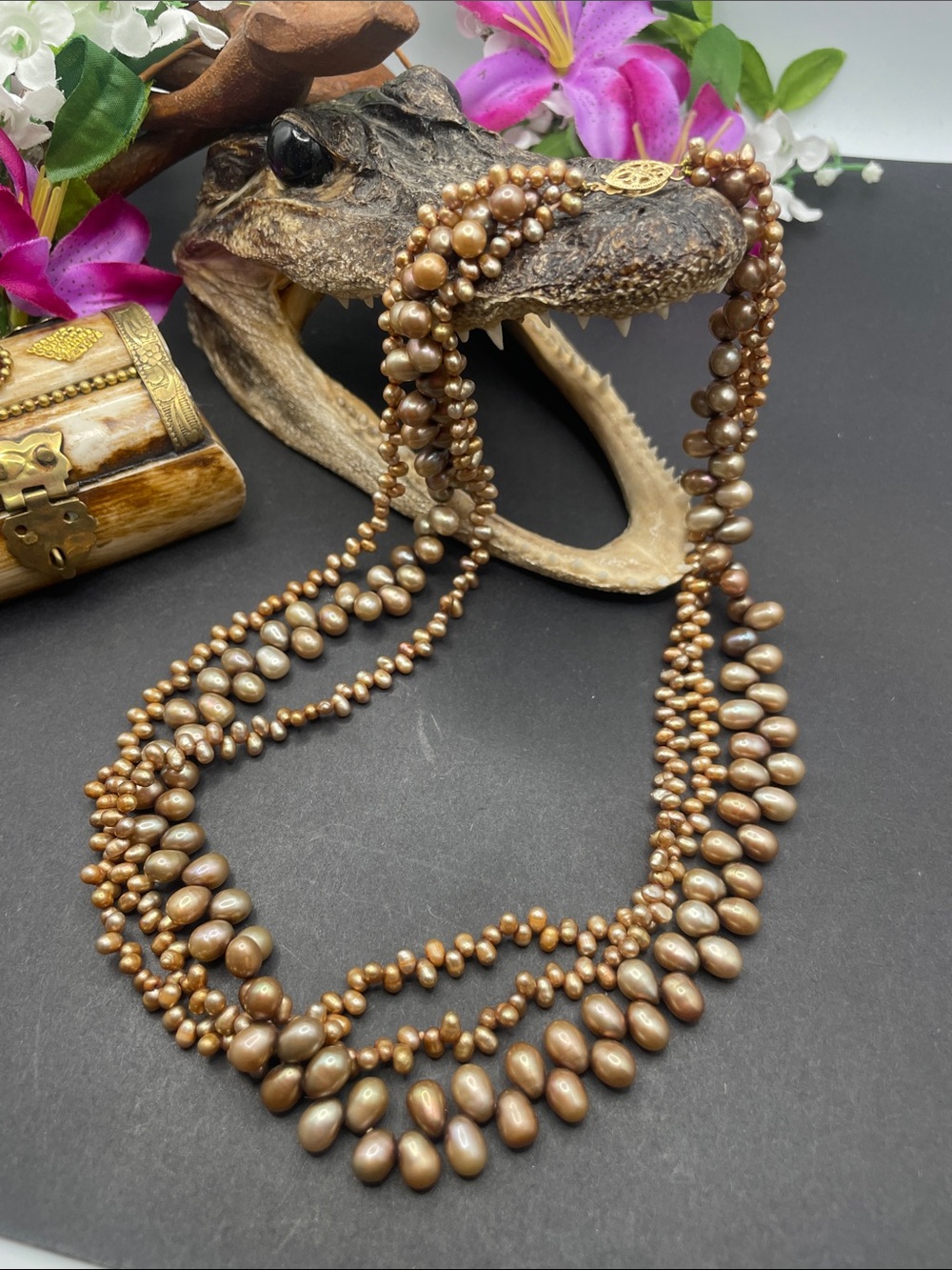 Cultured brown pearls and 14k clasp D1